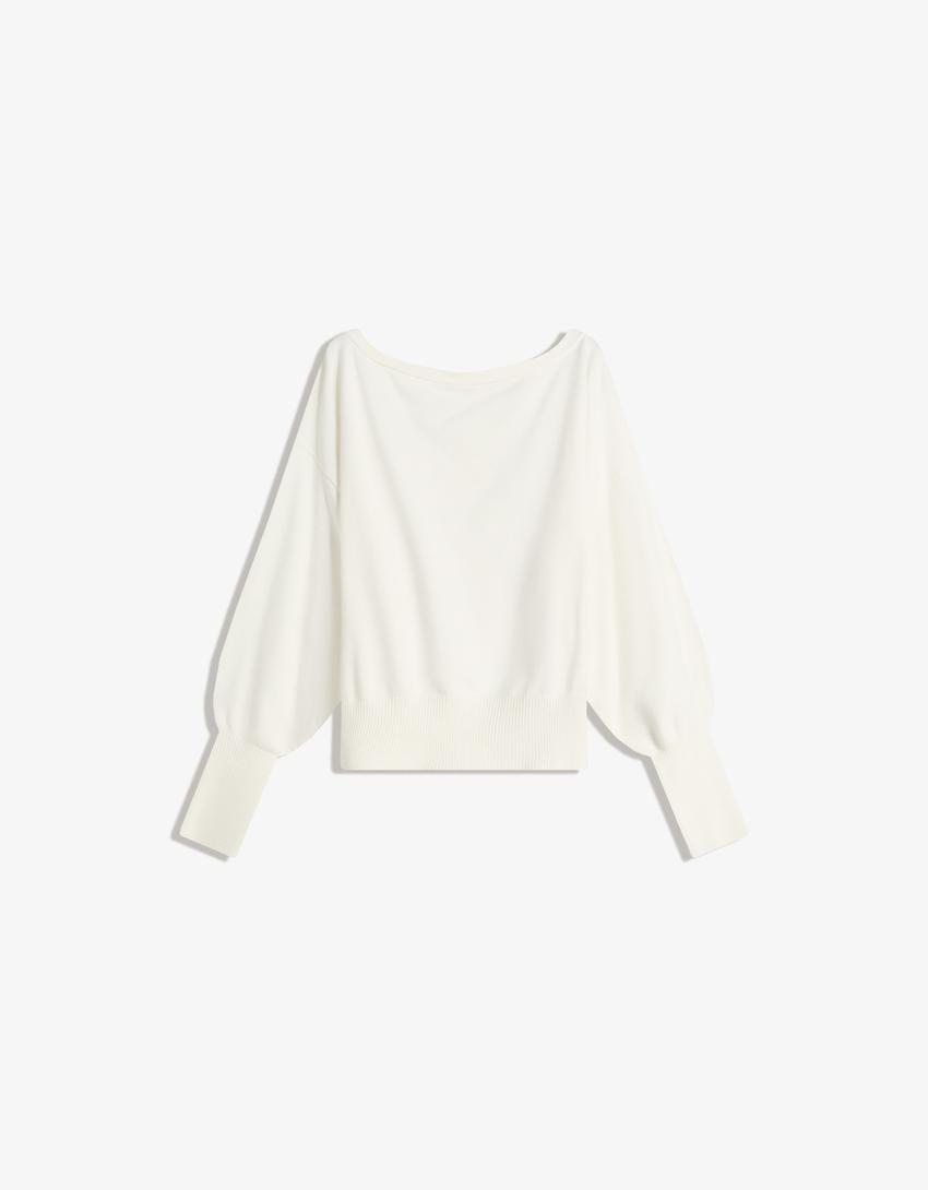 Blusa assimétrica com barra canelada