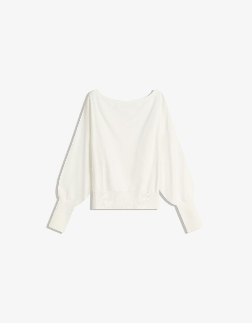 Blusa assimétrica com barra canelada