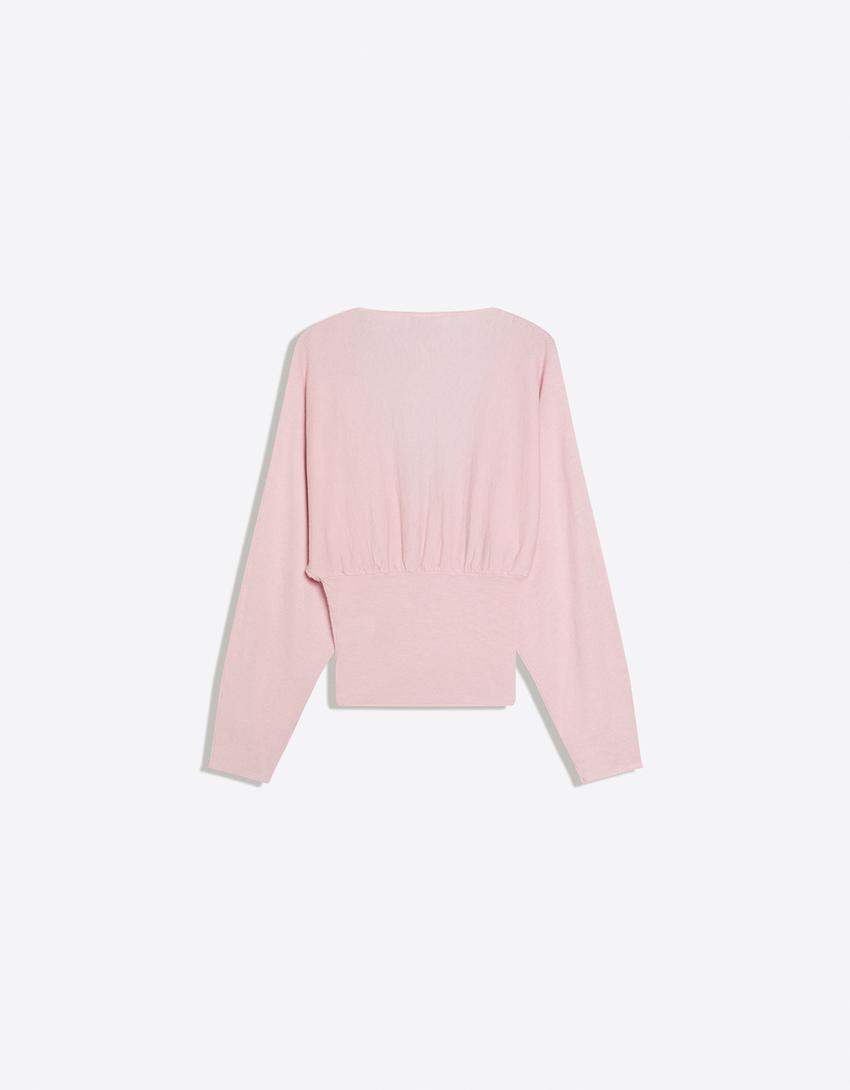 Blusa com decote em V e faixa