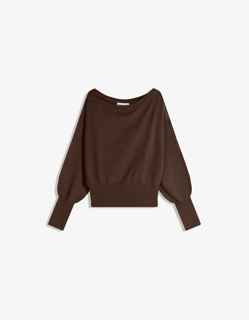 Blusa assimétrica com barra canelada