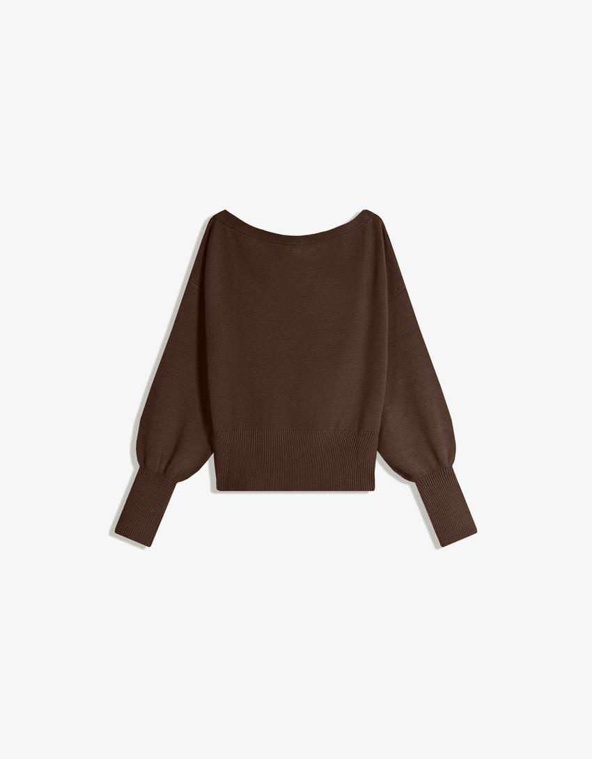 Blusa assimétrica com barra canelada